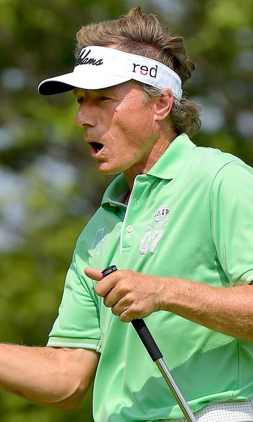 Bernhard Langer ties course record, leads Senior Players Championship